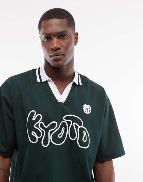 ASOS DESIGN boxy oversized polo with Kyoto bubble graphic in dark green