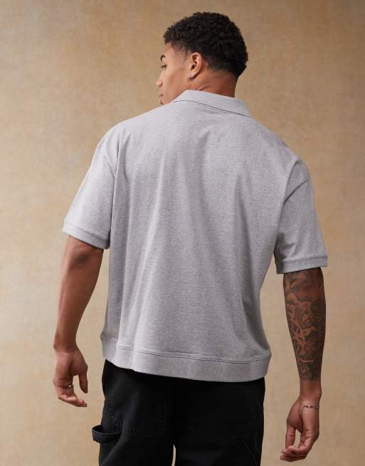 ASOS DESIGN boxy oversized polo with sports graphics in gray heather
