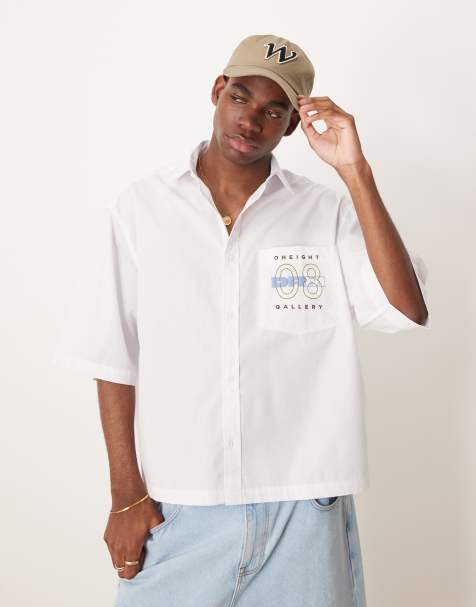 ASOS DESIGN boxy oversized poplin shirt with chest embroidery in white - view 1