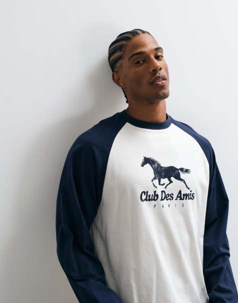 ASOS DESIGN boxy oversized raglan long sleeve top with club graphic print in cream - view 1