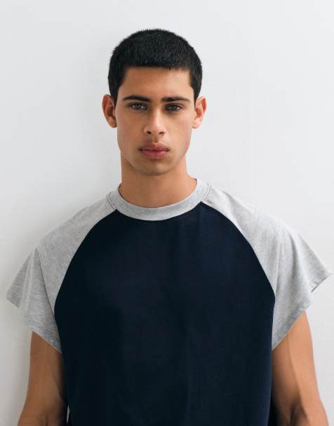 ASOS DESIGN boxy oversized raglan t-shirt in navy and grey - view 1
