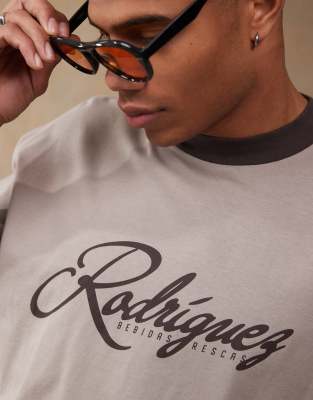 Asos Design Boxy Oversized Ringer T-shirt With Text Graphic In Brown