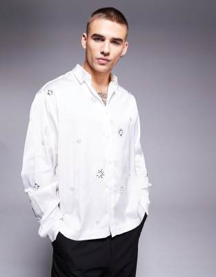 boxy oversized satin shirt with embellishments in white