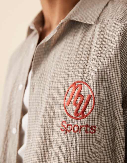 ASOS DESIGN boxy oversized shirt in brown plaid with chest embroidery