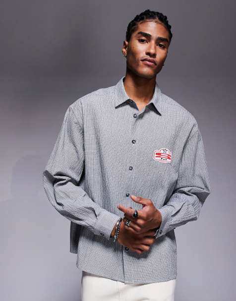 ASOS DESIGN boxy oversized shirt in navy check with chest badge - view 1