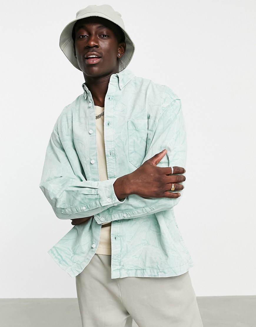 ASOS DESIGN boxy oversized shirt with bleach wash in sage green