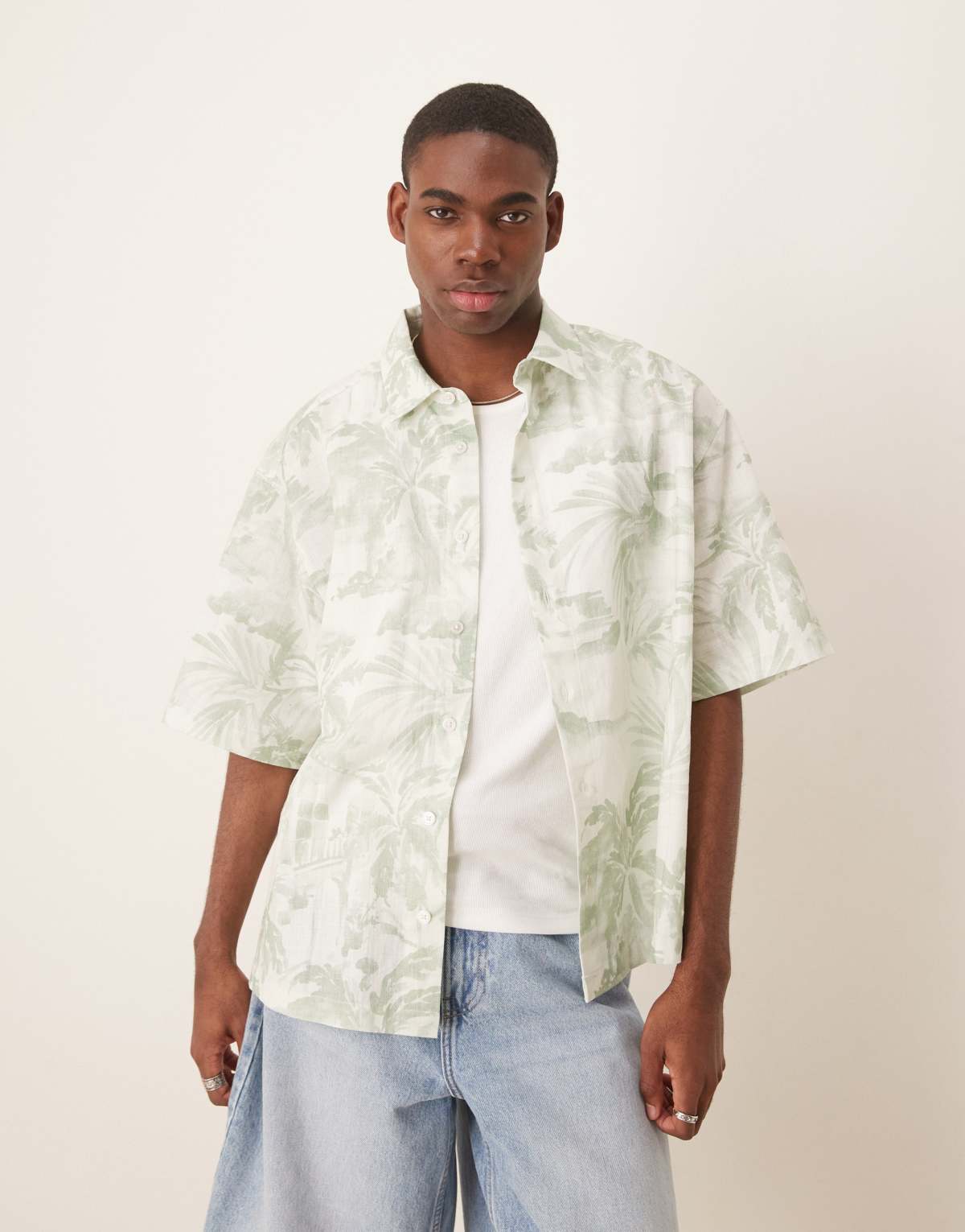 ASOS DESIGN boxy oversized shirt with floral print in green