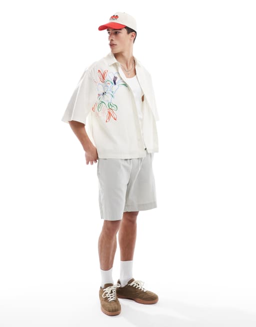 ASOS DESIGN boxy oversized shirt with floral print in stone