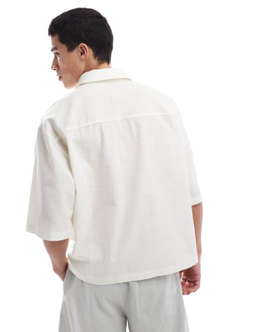ASOS DESIGN boxy oversized shirt with floral print in stone