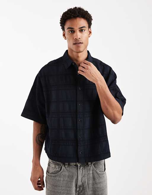 ASOS DESIGN boxy oversized shirt with textured check in black