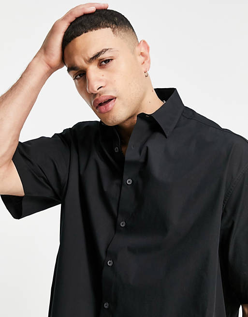 ASOS DESIGN boxy oversized short sleeve shirt in black | ASOS