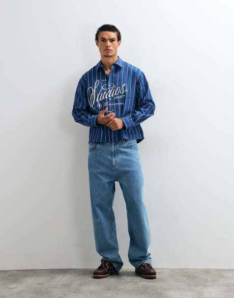 ASOS DESIGN boxy oversized stripe shirt with front graphic in blue - view 1
