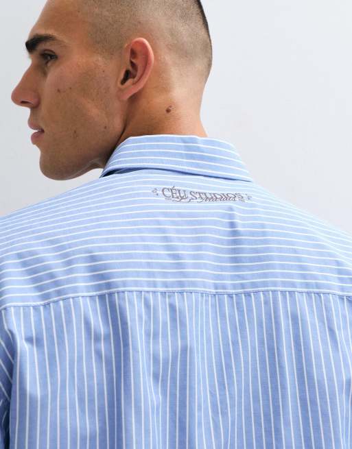 ASOS DESIGN boxy oversized stripe shirt with placement prints in blue, 2 of 5