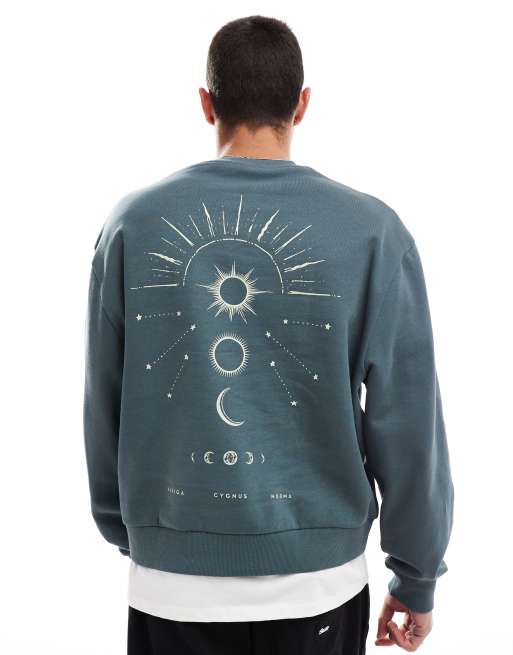 ASOS DESIGN - Boxy oversized sweatshirt met hemelse print op de achterkant in marineblauw met wassing