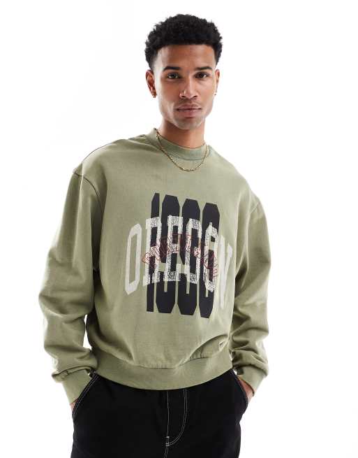 ASOS Design Boxy Oversized Sweatshirt with Acid Wash and Layered Print in Green