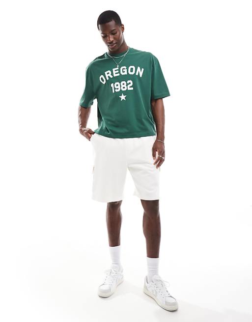 ASOS DESIGN boxy oversized t-shirt in dark green with Oregon ASOS DESIGN boxy oversized t-shirt in dark green with Oregon