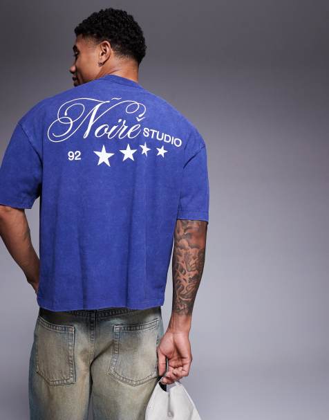 ASOS DESIGN boxy oversized t-shirt in heavyweight 220gsm washed blue with text graphic - view 1