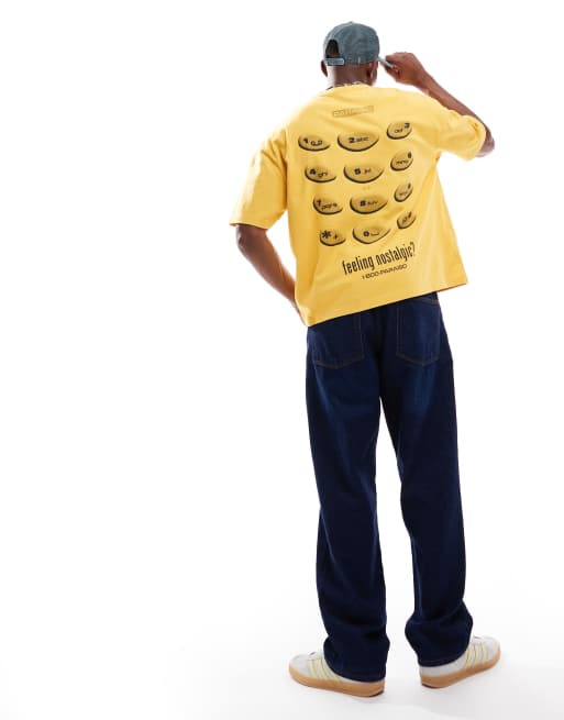 ASOS DESIGN boxy oversized t-shirt in heavyweight 220gsm washed yellow with nostalgic phone graphic