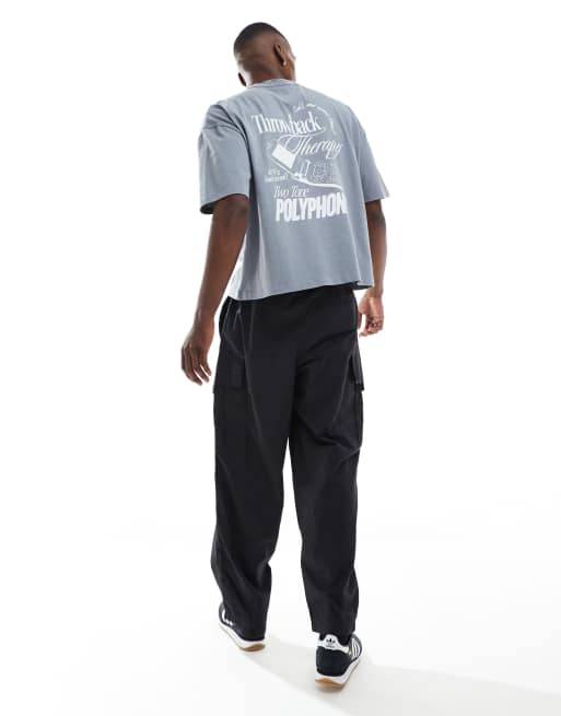 ASOS DESIGN boxy oversized t-shirt in heavyweight washed grey with street graphic, 2 of 4