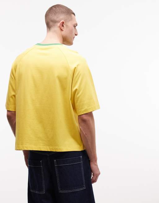 ASOS DESIGN boxy oversized t-shirt with Brasil football graphic in yellow, 5 of 5