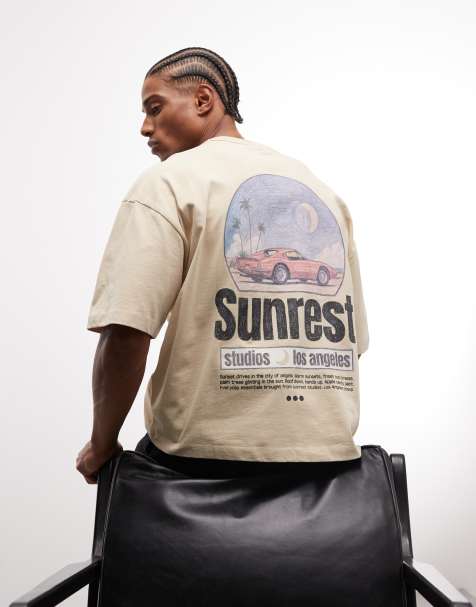 ASOS DESIGN boxy oversized t-shirt with car graphic in washed yellow