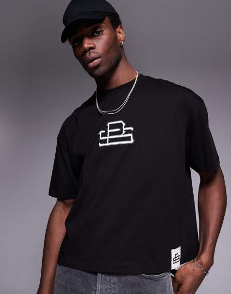ASOS DESIGN boxy oversized t-shirt with chest logo applique in black - view 1