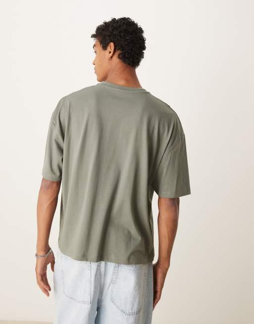 ASOS DESIGN boxy oversized t-shirt with city applique in khaki