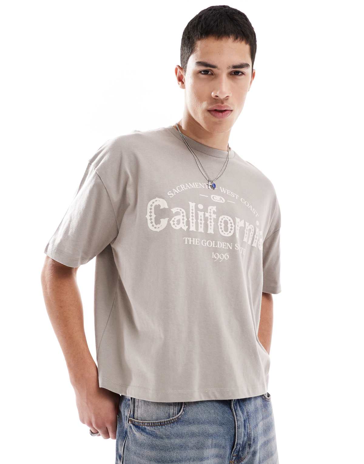 ASOS DESIGN boxy oversized t-shirt with city graphic in brown