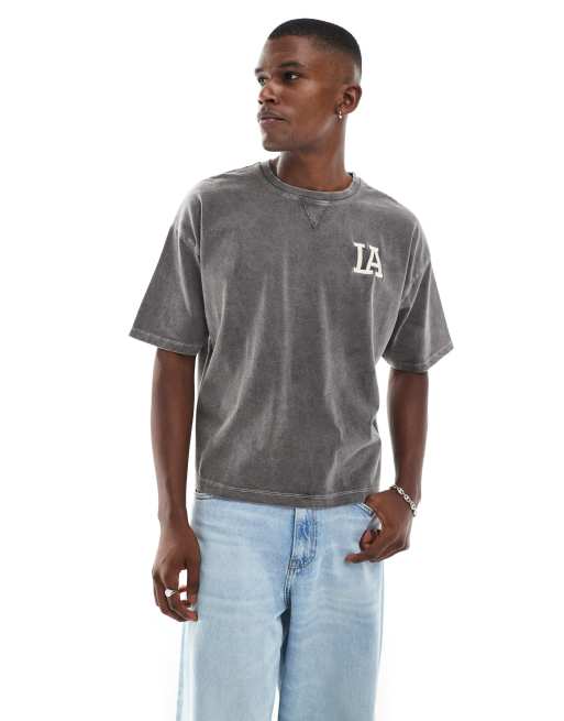 ASOS DESIGN boxy oversized T-shirt with city graphic in washed black