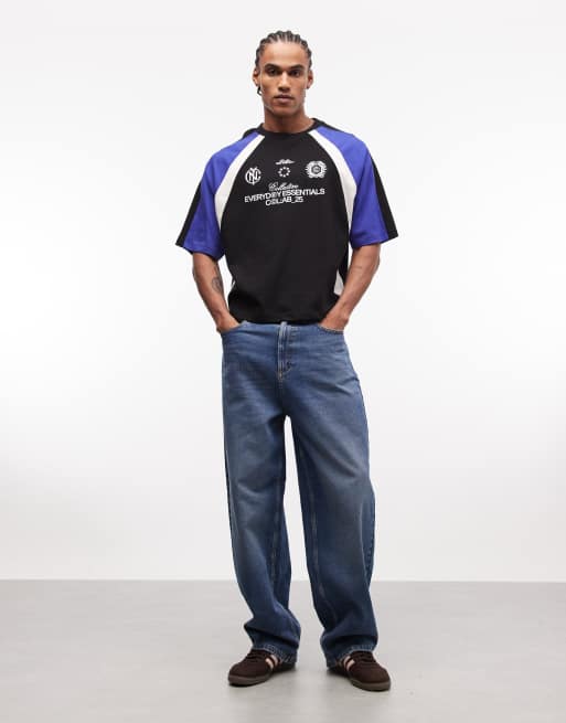 ASOS DESIGN boxy oversized t-shirt with cut and sew paneling and soccer graphics in black, 2 of 5
