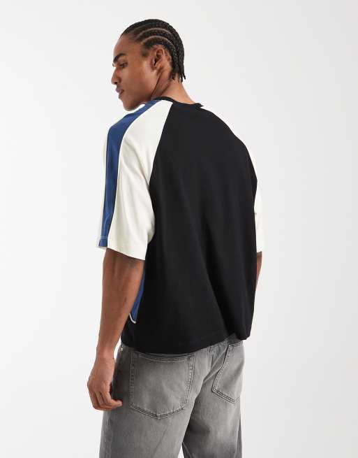 ASOS DESIGN boxy oversized t-shirt with cut and sew panelling and sports graphics in black, 3 of 5