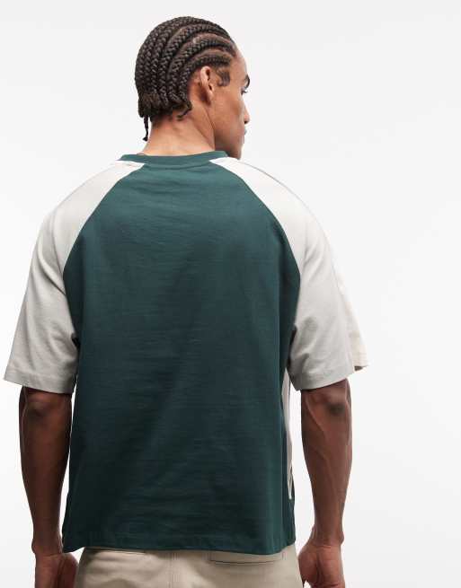 ASOS DESIGN boxy oversized t-shirt with cut and sew panelling and sports graphics in green, 5 of 5