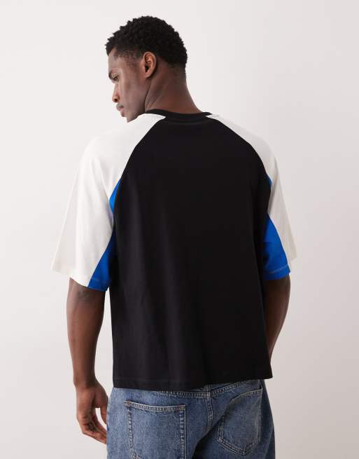 ASOS DESIGN boxy oversized t-shirt with cut and sew panelling and sports graphics in off white, 3 of 5