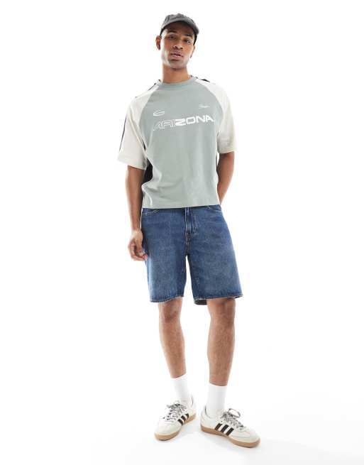 ASOS DESIGN boxy oversized T-shirt with cut and sew paneling and sports graphics in sage green