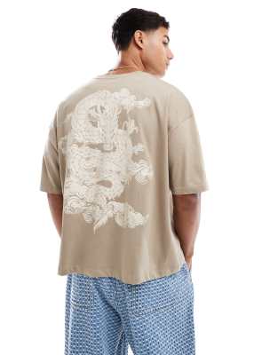 ASOS DESIGN boxy oversized t-shirt with dragon graphic in beige-Neutral