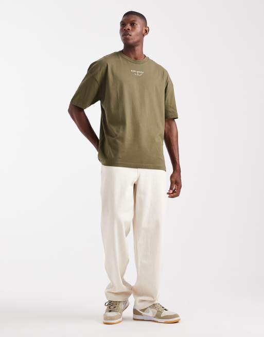 ASOS DESIGN boxy oversized t-shirt with dropped shoulders and street graphics in khaki green, 2 of 5