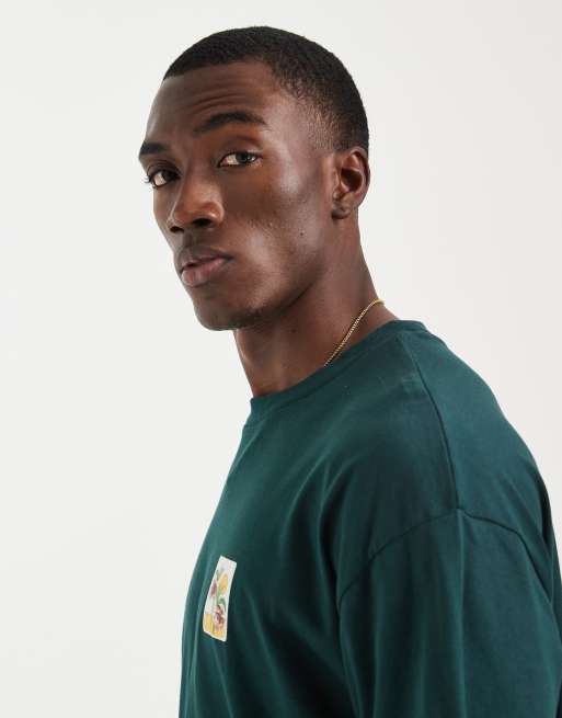 ASOS DESIGN boxy oversized t-shirt with floral chest print in dark green, 4 of 5