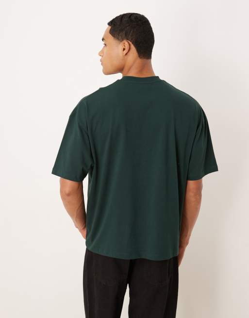 ASOS DESIGN boxy oversized t-shirt with floral graphic in dark green