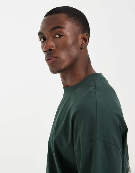 ASOS DESIGN boxy oversized t-shirt with floral graphic in green, 3 of 5