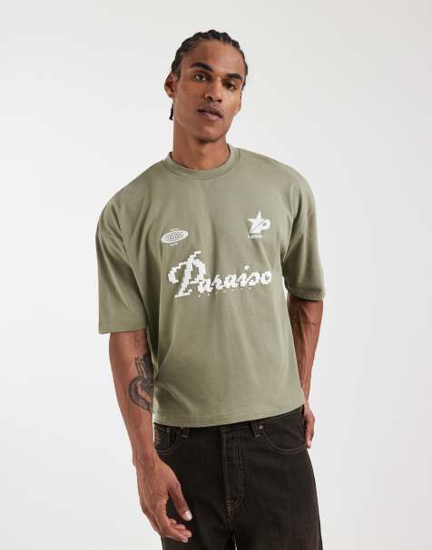 ASOS DESIGN boxy oversized t-shirt with football graphic in dark green - view 1
