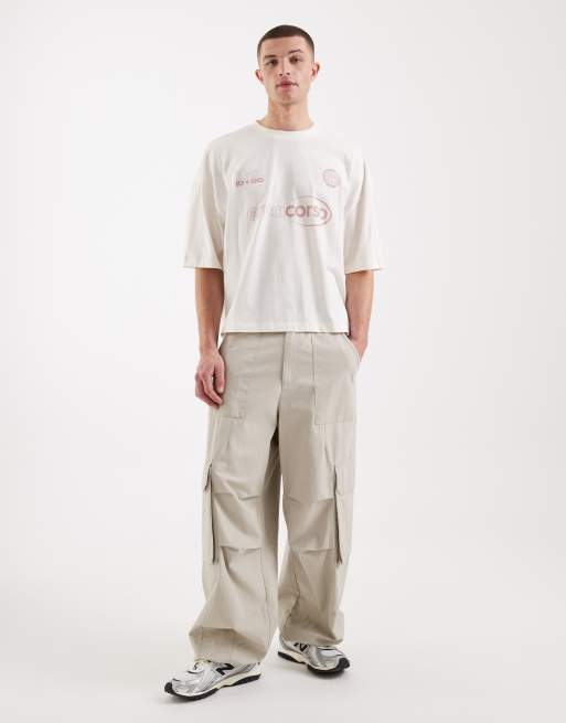 ASOS DESIGN boxy oversized t-shirt with football graphic in off white, 2 of 5