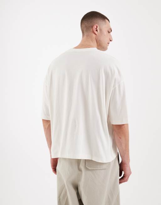ASOS DESIGN boxy oversized t-shirt with football graphic in off white, 3 of 5