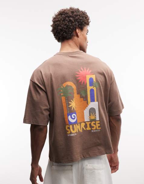 ASOS DESIGN boxy oversized t-shirt with holiday graphic in washed brown - view 1