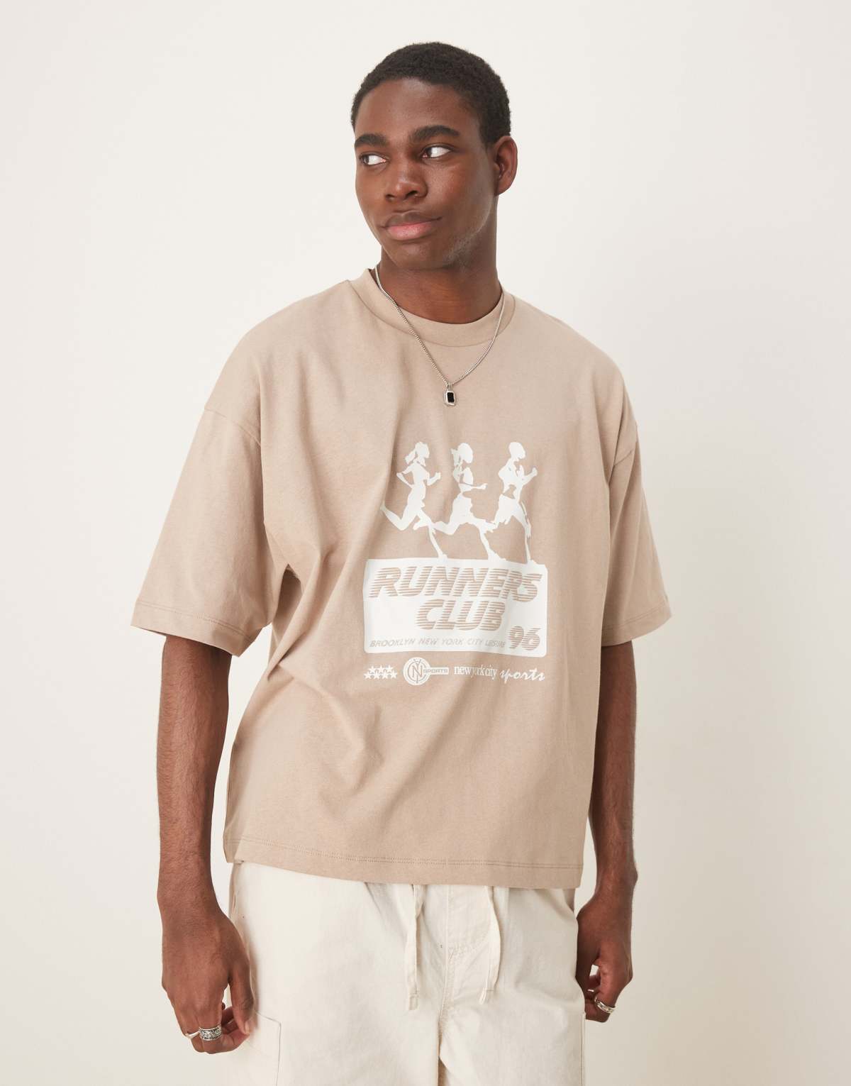 ASOS DESIGN boxy oversized t-shirt with running club graphic in beige