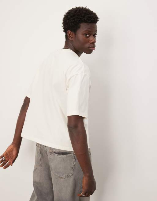 ASOS DESIGN boxy oversized t-shirt with ski sports graphic in cream