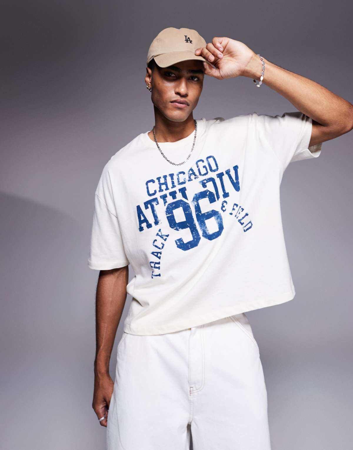 ASOS DESIGN boxy oversized t-shirt with sports graphic in cream