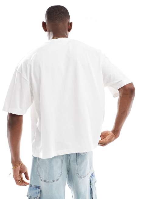 ASOS DESIGN boxy oversized t-shirt with sports graphic in white, 2 of 4