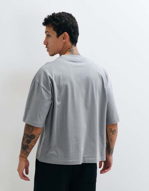 ASOS DESIGN boxy oversized t-shirt with street graphic in olive, 4 of 5