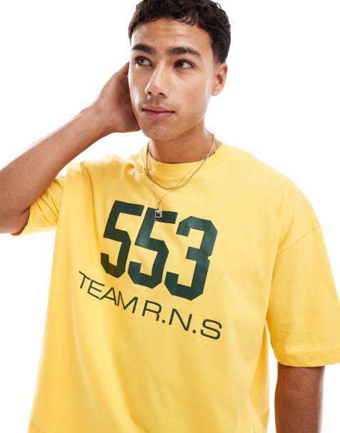 ASOS DESIGN boxy oversized t-shirt with street graphic in yellow - view 1