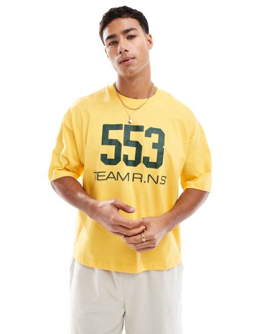 ASOS DESIGN boxy oversized T-shirt with street graphic in yellow